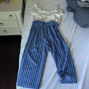 This is a size 14 kids and it is a cute romper to wear for fun occasions.